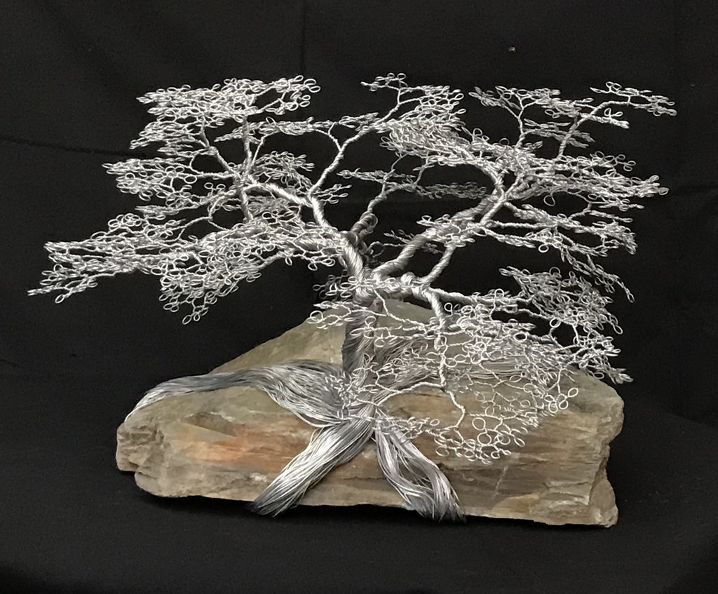 Original aluminium wire sculpture by Keith Simpson, available to purchase at Iona House Gallery in-store and online.