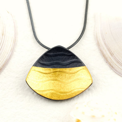 Sandra Elizabeth 'Sterling silver clam shell pendant with textured waves and 24 carat gold wave embellishment' 35x30mm